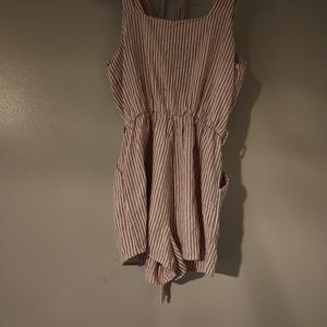 She + Sky small pink and white romper.